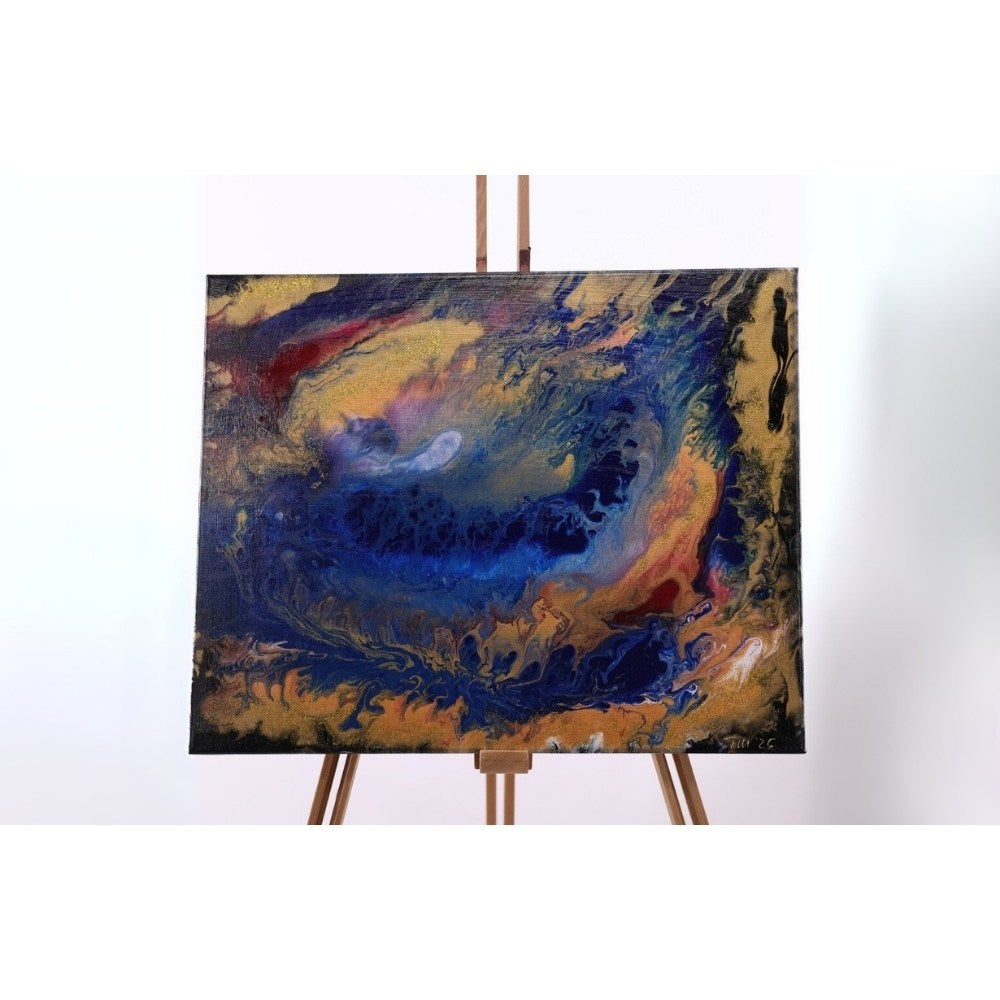 Acrylic Pouring Bild in blau gold und schwarz auf Staffelei