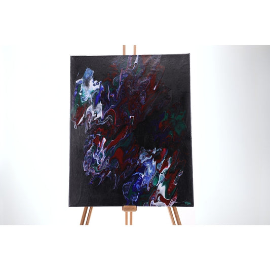 Acrylic Pouring Bild in dunklen Farben auf Staffelei