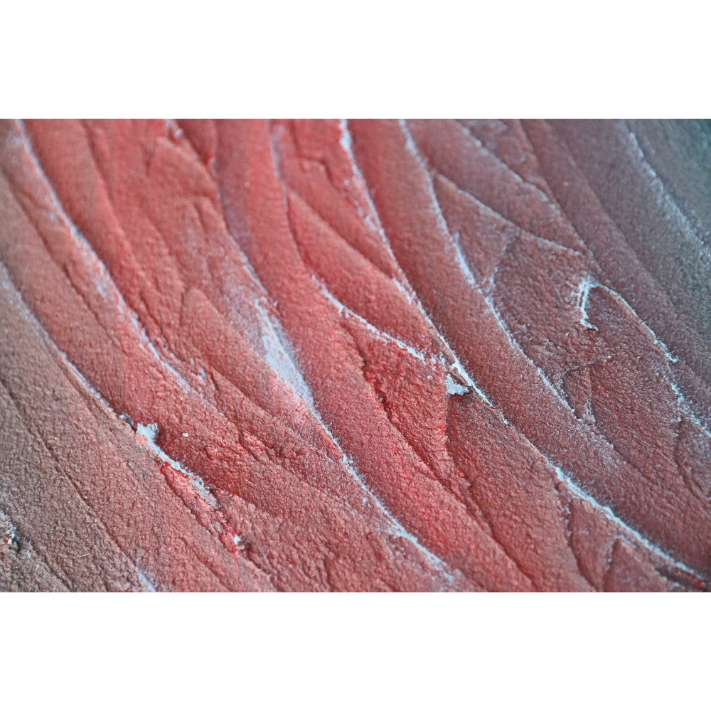 Strukturbild mit Wellen in schwarz rot und grün Detailaufnahme