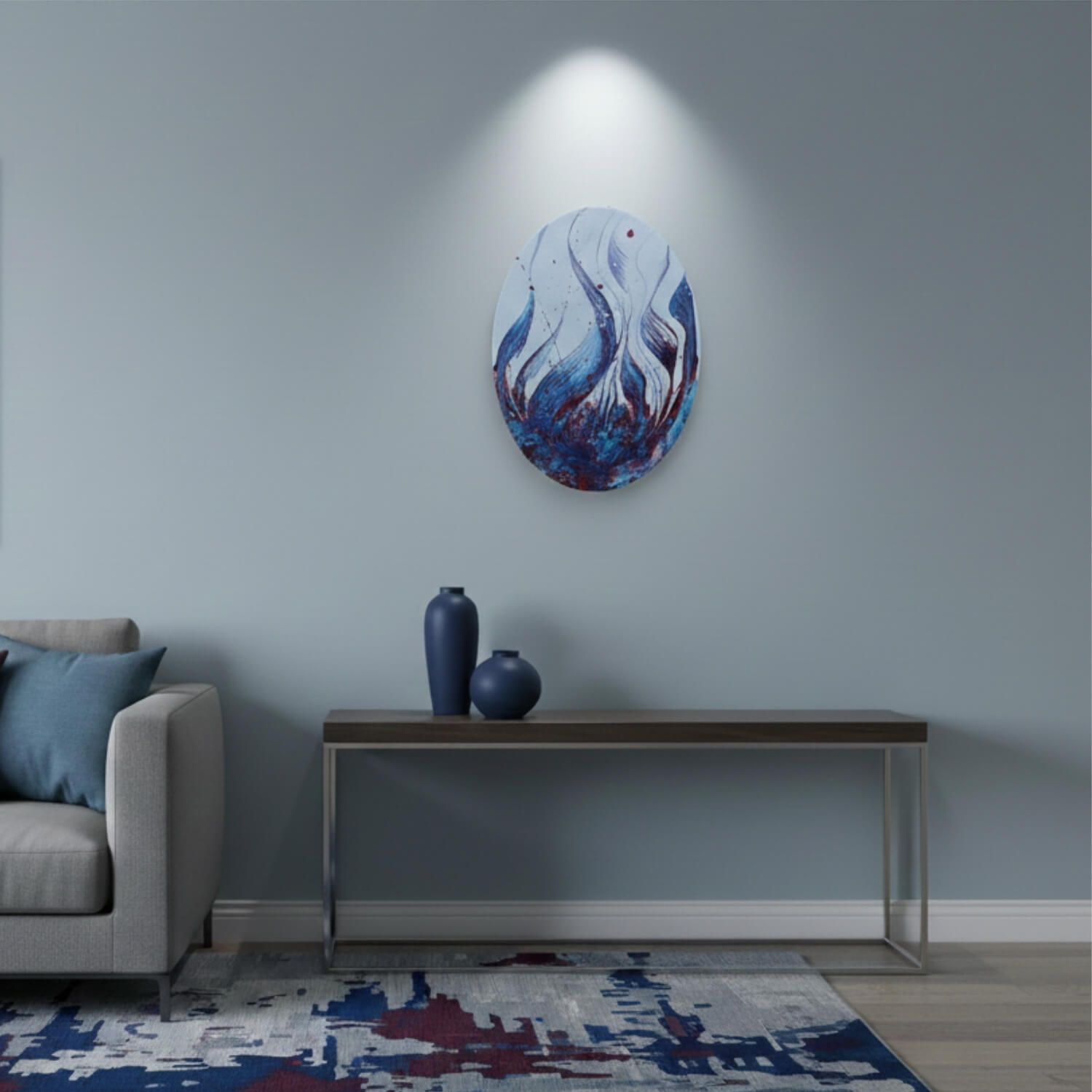 Abstraktes ovales Acrylbild in glauen und roten Farben an Wand